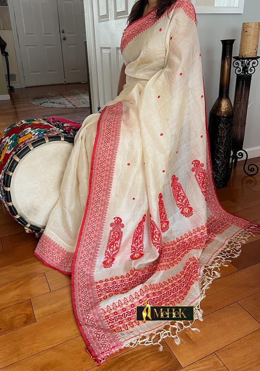 Handloom Tussar Silk Saree in white color with red thread woven border and pallu