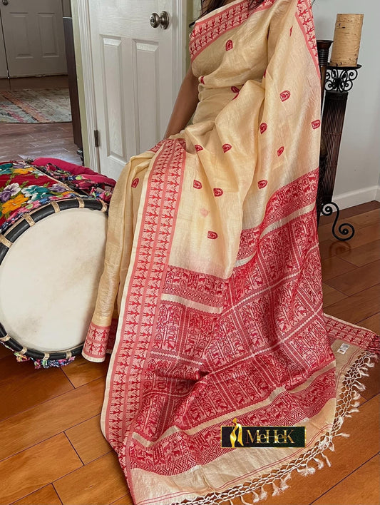 Handloom Tussar Silk Saree in white color with red thread woven border and pallu.